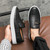 Men's black weave pattern accents tassel slip on shoe loafer 02