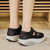 Women's black hollow & cut out velcro slip on rocker bottom shoe 06