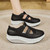 Women's black hollow & cut out velcro slip on rocker bottom shoe 07