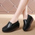 Women's black sewn thread accents slip on rocker bottom shoe 02