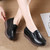 Women's black sewn thread accents slip on rocker bottom shoe 06