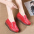 Women's red sewn thread accents slip on rocker bottom shoe 06