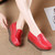 Women's red sewn thread accents slip on rocker bottom shoe 07