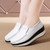 Women's white sewn thread accents slip on rocker bottom shoe 04