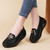 Women's black metal buckle slip on rocker bottom shoe 06