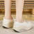 Women's beige stretch lace accents rocker bottom shoe sneaker 08
