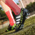 Black triple stripe label print soccer shoe 04