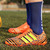 Orange triple stripe label print soccer shoe 10