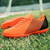 Orange check stripe pattern soccer shoe 06