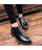 Black buckle slip on dress shoe boot with zip on side 10