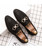 Black metal buckle slip on dress shoe 10