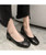 Black bow tie slip on low heel dress shoe 03