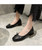 Black bow tie slip on low heel dress shoe 04