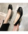 Black bow tie slip on low heel dress shoe 05