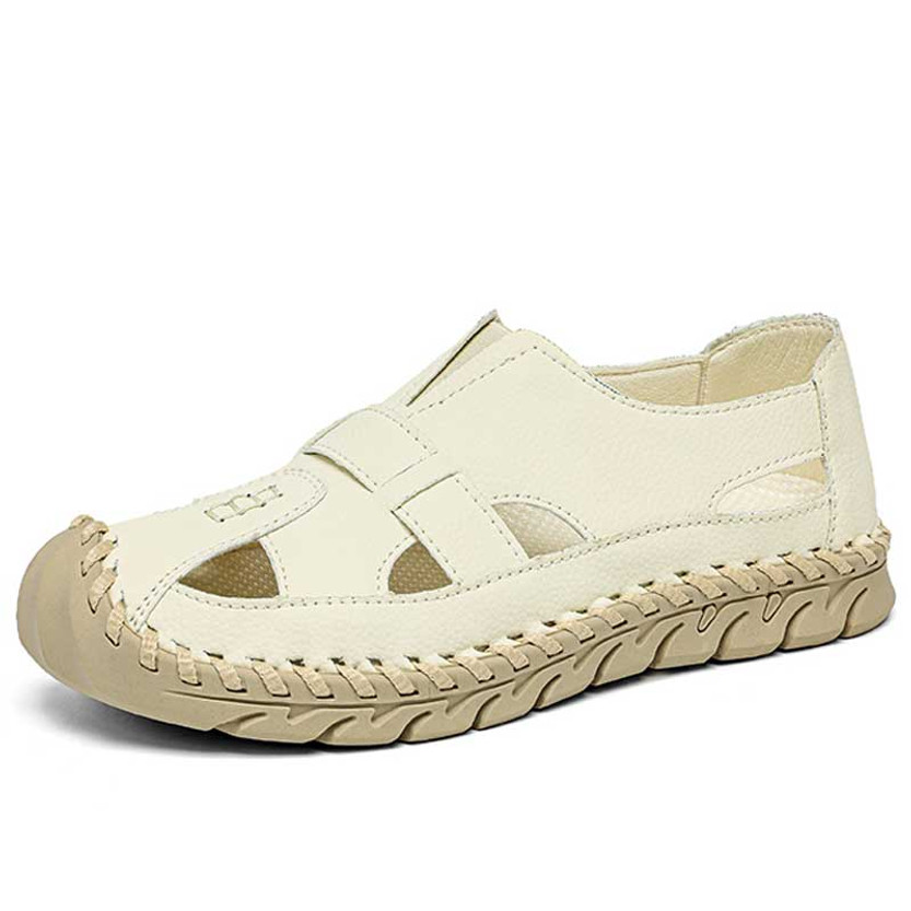 Women's beige hollow cut slip on shoe sandal 01