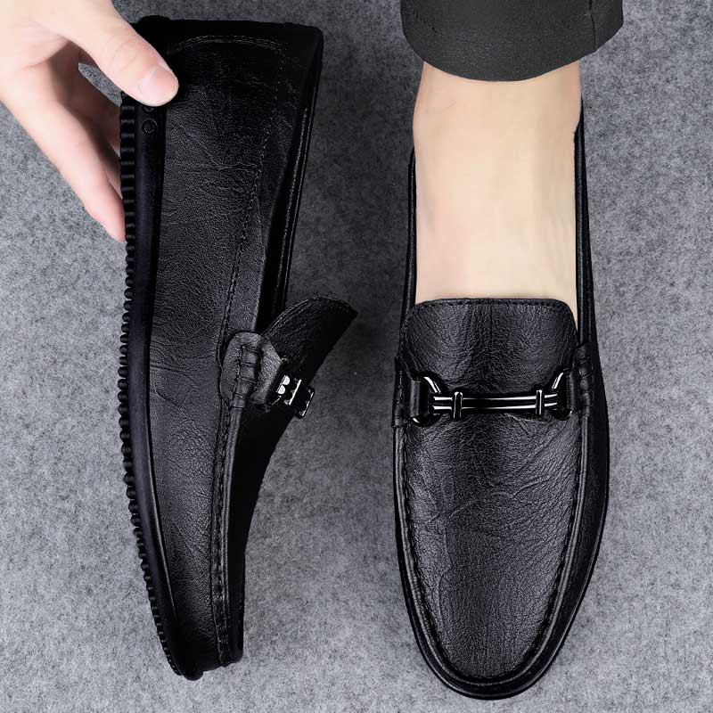 Black metal buckle on top slip on shoe 