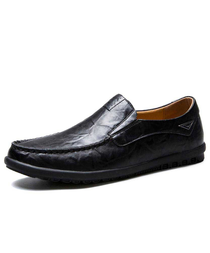 Black leather slip on shoe loafer with metal ornament 01
