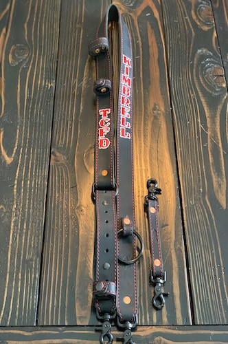 Shown with add on second Cord Keeper. Mag light holder. Long Anti Sway Strap. 