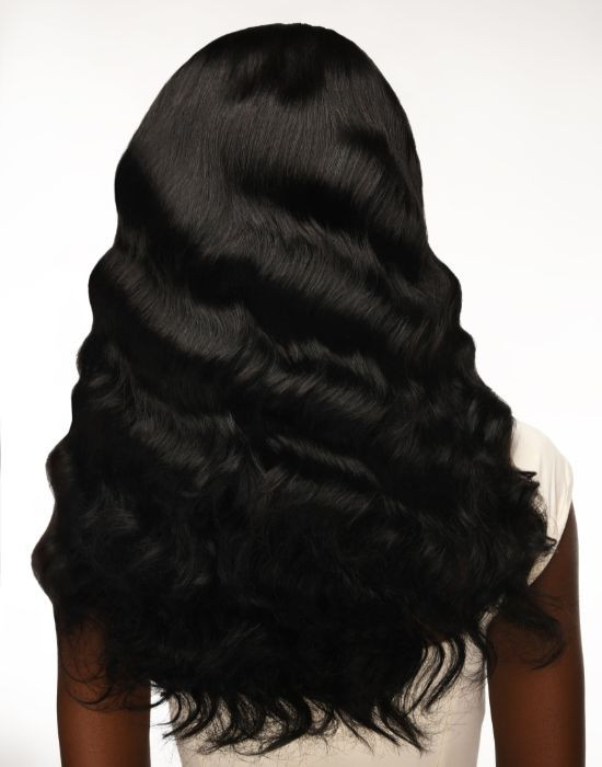 Woman wearing Feme Human Hair Weave Body Wave