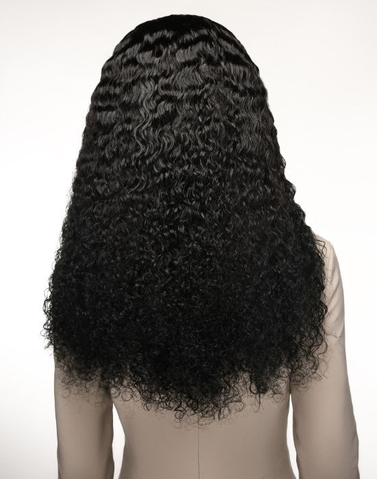 Woman wearing Feme Human Hair Water Curl