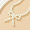 Beaded Bow Necklace: Pearls