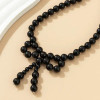 Beaded Bow Necklace: Black