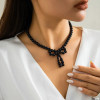 Beaded Bow Necklace: Black