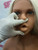 face close up with gloved hand demonstrating mouth detail