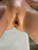 Lower angle close-up of the doll's vaginal area for condition transparency
