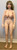 Full front view of the 100 cm Piper Ariel silicone doll wearing the included green wig, showing white skin tone, J-cup body shape, and standing feet.