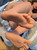 Close-up of the Iracone doll feet and leg area showing TPE condition and foot detail.