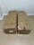 Photo of original long cardboard doll box showing exterior condition and shipping packaging.