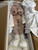 Full boxed view of the 165 cm WM Doll showing body, packaging, accessories, and original storage condition.