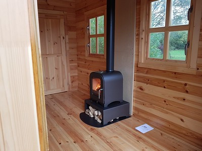 Light Up Your Tranquillity: Log Burners in Your Timber Spaces
