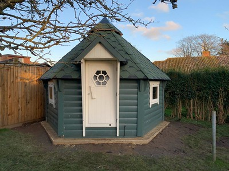 A grill cabin can enhance the overall outdoor living experience in a garden setting in several ways: