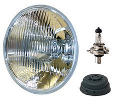 HELLA 002395301 SINGLE HDLMP CONV SAE7'RD Replaces Sealed Beam Head Light; 7 Inch Round; Standard Lens; 9003/ HB2 Bulb; Without Turn Signal; Features Improved Optics Without Increased Glare; Single