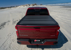 BAK IND 448507 BAK MX4 05-16 FRONTIER 6' Hard Folding; 2 Folds/ 3 Panels; Front Hinge Allows Entire Tonneau to Flip Up When Folded; Lockable Using Tailgate Handle Lock; Black Matte; Aluminum; Can Be Used With BAK Tool Box