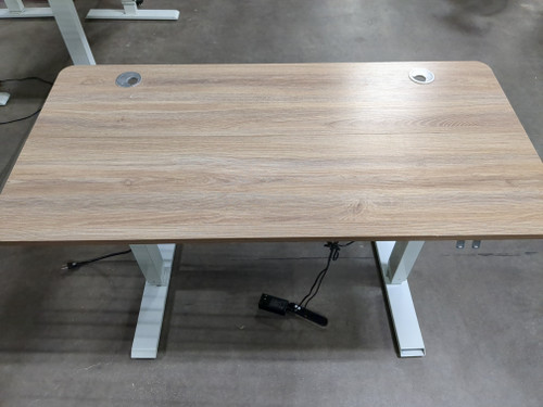 Darker wood-grain electronic desk w/holes