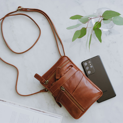 tan leather smartphone crossbody bag with long adjustable shoulder strap