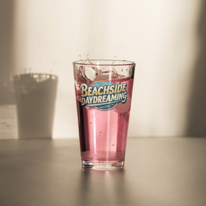 Drift into coastal calm with the Beachside Daydreaming Shaker Pint Glass.