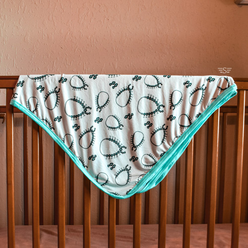 bamboo baby blanket, western baby blanket, turquoise baby blanket, squash blossom baby blanket, western bamboo blanket, cowboy baby blanket, cowgirl baby blanket, western nursery blanket, turquoise jewelry blanket, breathable bamboo blanket, buttery soft baby blanket, western baby gift, gender neutral baby blanket, southwestern baby blanket, bamboo toddler blanket