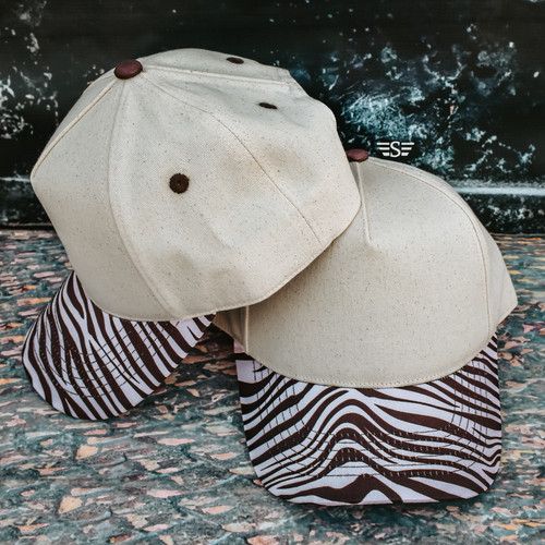 Magna Pony cap, ponytail hat, messy bun hat, women’s trucker cap, canvas trucker hat, western boutique cap, zebra print bill hat, neutral trucker cap, high ponytail hat, snapback ponytail cap, western style women’s hat, Flying S Company cap, everyday western hat, boutique baseball cap, hair up hat