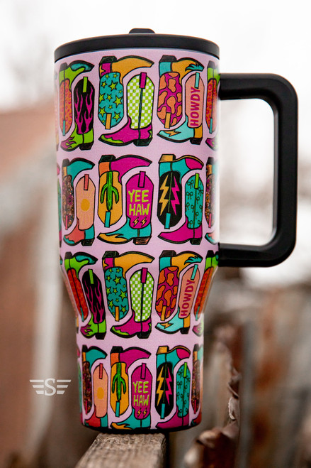 32oz western tumbler, western boot tumbler, colorful cowgirl tumbler, boutique drinkware, insulated stainless steel tumbler, 32oz handled tumbler, flip straw lid tumbler, spill-resistant cup, yeehaw tumbler, western aesthetic drinkware, statement tumbler cup, keeps drinks cold for hours, hot drink friendly, travel-ready tumbler, BPA-free lid and straw, reusable western cup, gift-worthy cowgirl tumbler