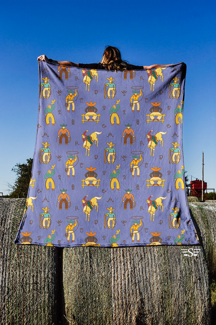 denim cowboy blanket, western throw blanket, cowboy and horse blanket, blue western décor, ranch house blanket, rodeo lifestyle throw, cowboy home décor, western couch throw, cabin blanket, trailer décor blanket, rustic western blanket, ranch style throw, cowboy gift for him, western gift for her, soft cozy throw, living room accent blanket, western bed blanket, Americana western blanket, ranch life décor, modern western blanket, boutique western throw, rodeo fan blanket, cowboy statement blanket