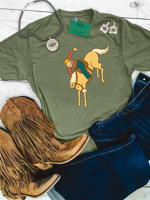 western graphic tee, bronc rider shirt, rodeo graphic tee, broke western shirt, cowboy graphic tee, western boutique tee, ranch lifestyle apparel, rodeo outfit shirt, western casual wear, cowboy culture shirt, western illustration tee, bronc riding apparel, stock show outfit tee, western art shirt, cowboy casual top, western men women tee, rodeo style graphic shirt, modern western apparel