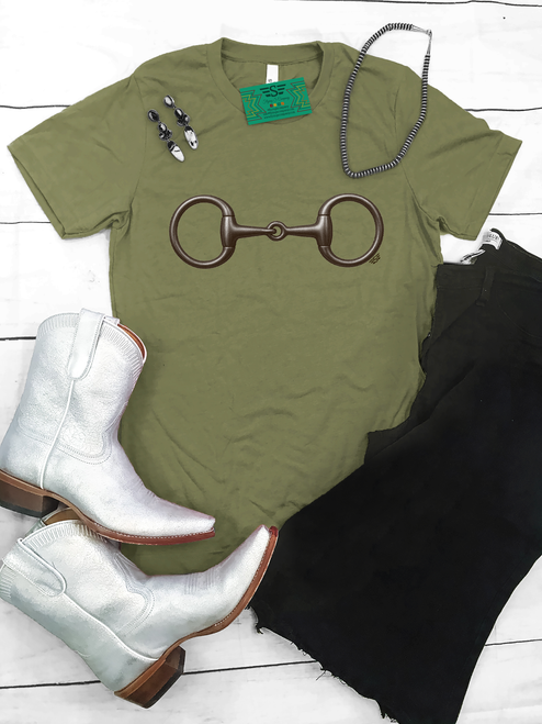 western graphic tee, cowgirl t shirt, snaffle bit shirt, western horse shirt, equestrian graphic tee, rodeo outfit top, ranch wear shirt, olive green western tee, horse lover gift, country western clothing, western boutique top, cowgirl outfit shirt, barn style apparel, rodeo fashion tee, minimalist western shirt, horse bit graphic tee, southern western style, women’s western t shirt, unisex western tee, western aesthetic clothing