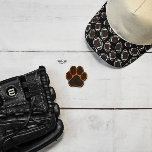 paw print leather patch, paw leather patch, paw patch, leather paw patch, paw print hat patch, dog paw leather patch, pet leather patch, mascot leather patch, school mascot patch, animal paw patch, dog lover patch, pet lover gift, laser engraved leather patch, genuine leather patch, trucker hat patch, western leather patch, rustic leather patch, dog accessory, pet accessory, sports mascot patch
