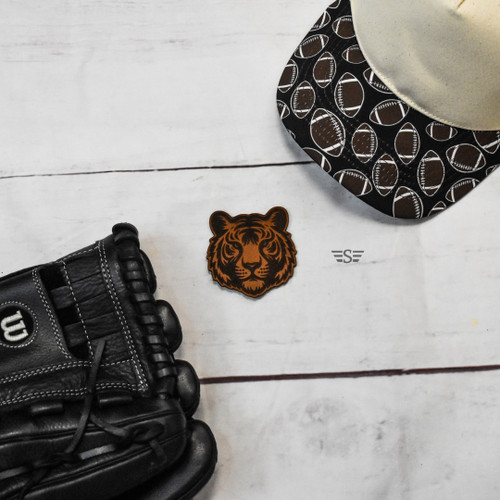 tiger leather patch, tiger patch, leather tiger patch, tiger head leather patch, tiger mascot patch, tiger hat patch, tiger trucker hat patch, school mascot leather patch, sports mascot patch, genuine leather patch, laser engraved leather patch, western leather patch, mascot patch, varsity patch, football mascot patch, baseball mascot patch, wrestling mascot patch, school spirit patch, tiger accessory, custom leather patch