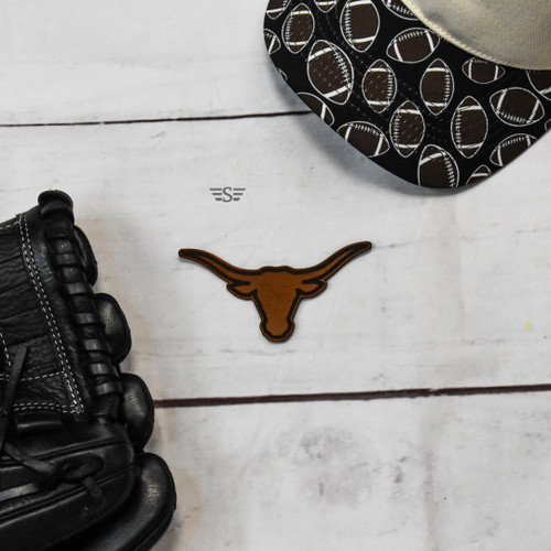 longhorn leather patch, longhorn patch, leather longhorn patch, western leather patch, longhorn head patch, cow head leather patch, cattle patch, steer leather patch, western hat patch, cowboy patch, ranch patch, rodeo patch, Texas longhorn patch, mascot leather patch, school mascot patch, laser engraved leather patch, genuine leather patch, trucker hat patch, western accessory, rustic leather patch