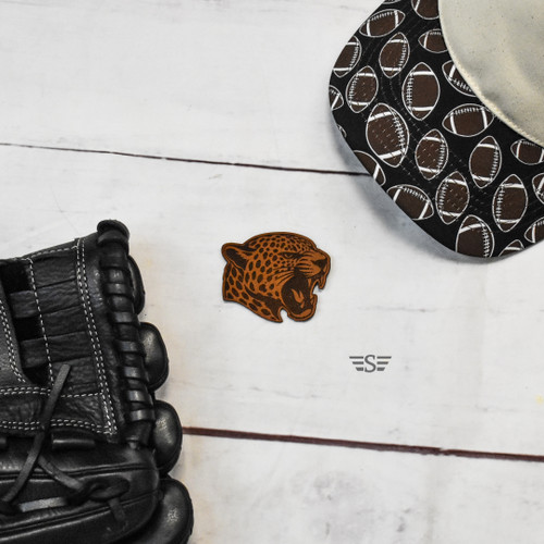 Leopard Leather Patch, Jaguar Leather Patch, Leopard/Jaguar Leather Patch, Leopard Head Leather Patch, Jaguar Head Leather Patch, Leopard Mascot Leather Patch, Jaguar Mascot Leather Patch, Panthers Leather Patch, Wildcats Leather Patch, Cougars Leather Patch, Cheetah Leather Patch, Big Cat Leather Patch, School Mascot Leather Patch, Team Spirit Leather Patch, Leather Hat Patch, Genuine Leather Patch, Laser Engraved Leather Patch, Custom Hat Patch, Richardson Hat Patch, Trucker Hat Patch, Football Mascot Patch, Baseball Mascot Patch